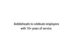 text: Bobbleheads to celebrate employees with 10+ years of service